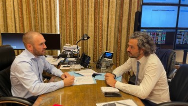Guzmán y Cafiero, que se reunirá con representantes de Estados Unidos, hablaron sobre la negociación con el FMI.