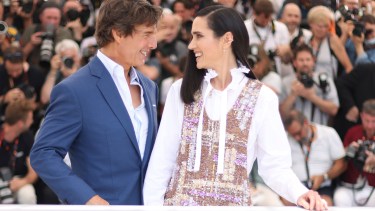 Tom Cruise, left, and Jennifer Connelly pose for photographers at the photo call for the film 'Top Gun: Maverick' at the 75th international film festival, Cannes, southern France, Wednesday, May 18, 2022. (Photo by Vianney Le Caer/Invision/AP)