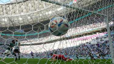 Saudi Arabia's Saleh Al-Shehri scores his side's opening goal during the World Cup group C soccer match between Argentina and Saudi Arabia at the Lusail Stadium in Lusail, Qatar, Tuesday, Nov. 22, 2022. (AP Photo/Ricardo Mazalan)