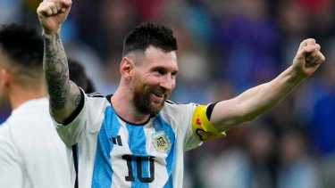 Argentina's Lionel Messi celebrates defeating Croatia 3-0 in a World Cup semifinal soccer match at the Lusail Stadium in Lusail, Qatar, Tuesday, Dec. 13, 2022. (AP Photo/Natacha Pisarenko)