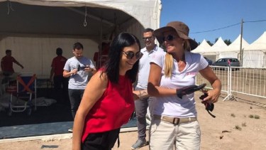 Peve con Ortiz Luna, cuando dirigía el SIEN, del que la desvincularon en julio del 2020. (Twitter).-