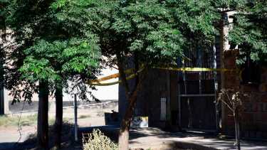 Uno de los cuerpos fue hallado en una casa del barrio Los Hornitos de Neuquén. (Foto matías Subat).-