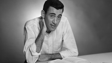 NEW YORK - NOVEMBER 20, 1952: Author JD Salinger poses for a portrait as he reads from his classic American novel "The Catcher in the Rye" on November 20, 1952 in the Brooklyn borough of New York City. Salinger died on January 27, 2010. (Photo by Antony Di Gesu/San Diego Historical Society/Hulton Archive Collection/Getty Images)
