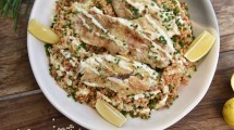 Imagen de Arroz caldoso con filet de pescado para compartir en la mesa familiar