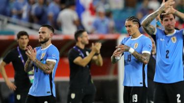 Nández, Núñez y Josema Giménez, pilares de la selección oriental. (AP)